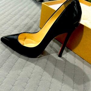 Black red bottoms worn a couple of times but in good condition.